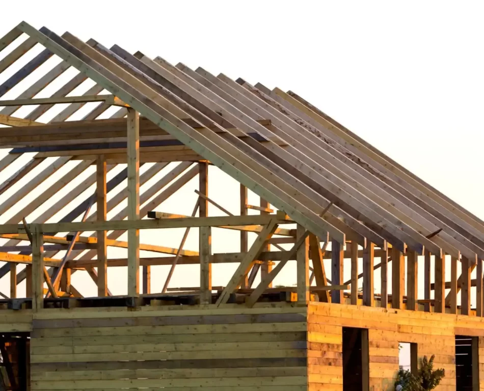 View of an attic on a wood framed building of a house under construction.