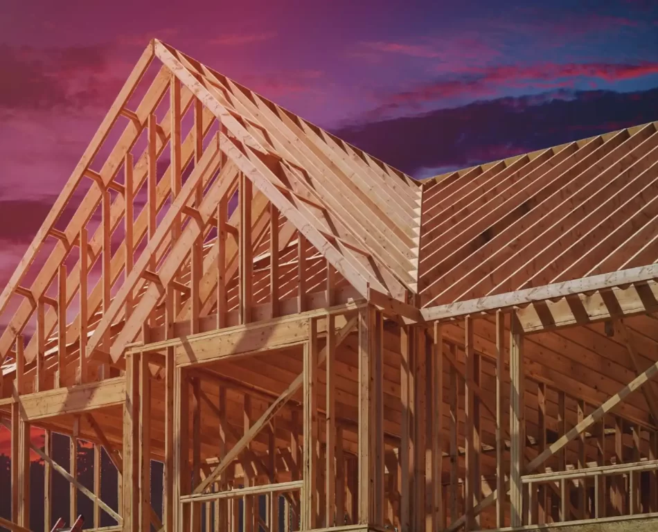 Wood building house under construction with beautiful sky at sunset.